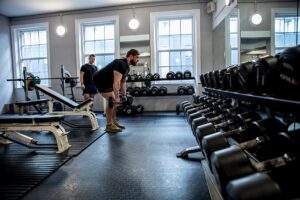 brick room with yoga mats