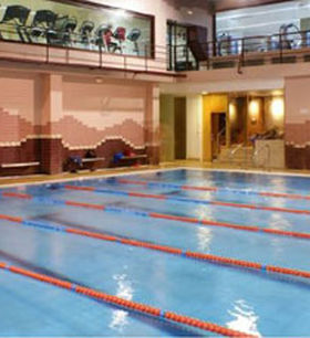 Fitness machines and a red door